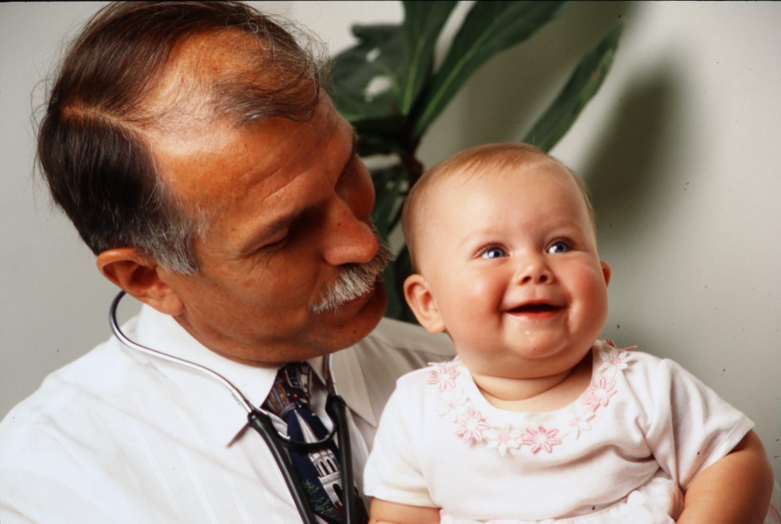 A Sioux Falls family physician with an infant patient — full-spectrum family medicine from the beginning